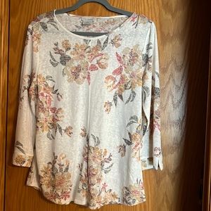 Pretty light weight flowered shirt.  Dress it up or wear it casual.